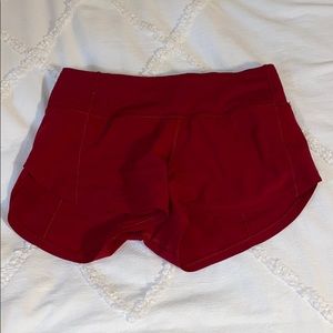 red lululemon shorts
